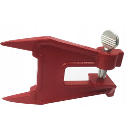 PRZYRZĄD DO TRZYMANIA PROWADNICY PRZY OSTRZENIU